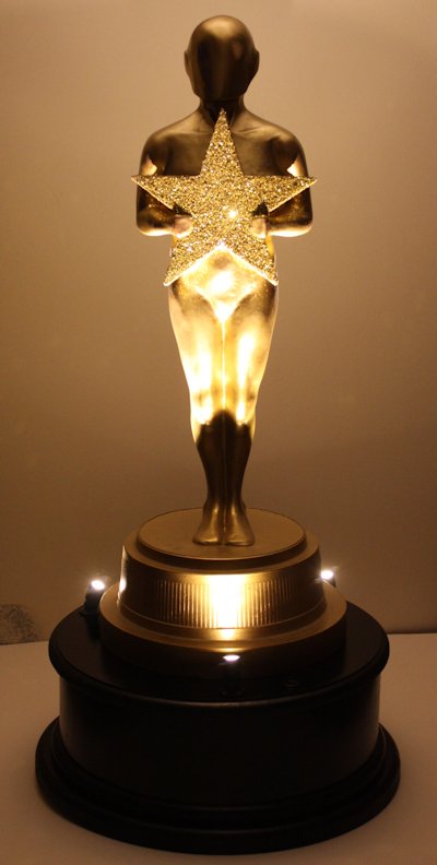 award statue illuminated
